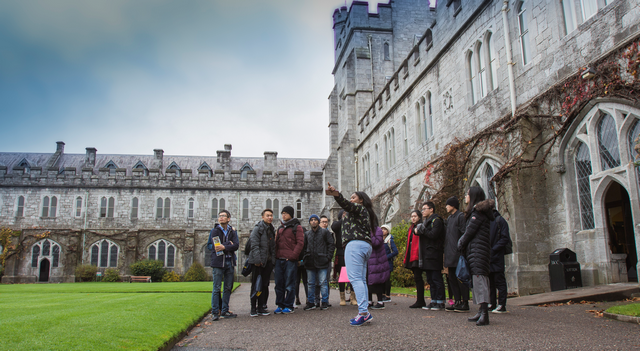 Image of a group of students gathered at The Quad, UCC.